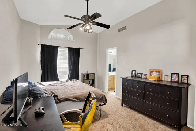 a view of a house with backyard porch and sitting area