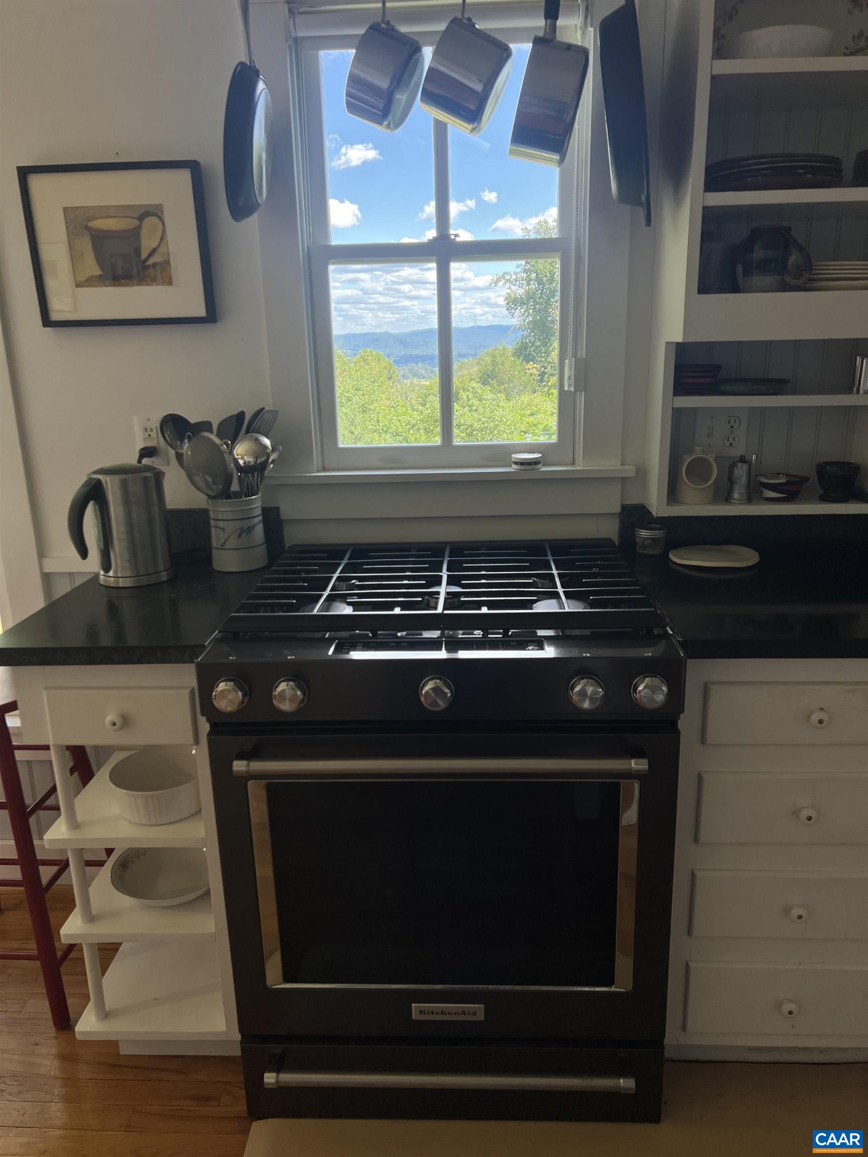 6630 Highlander Way Crozet, VA 22932 - Photo 39 of 41 a stove top oven sitting inside of a kitchen
