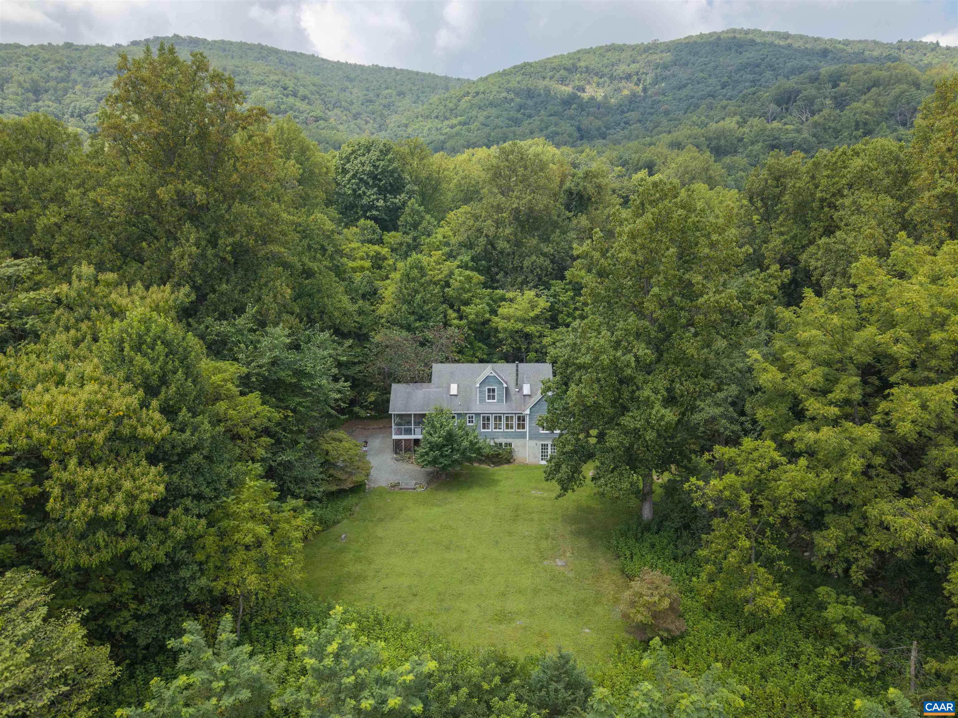 6630 Highlander Way Crozet, VA 22932 - Photo 4 of 41 an aerial view of a house with a yard
