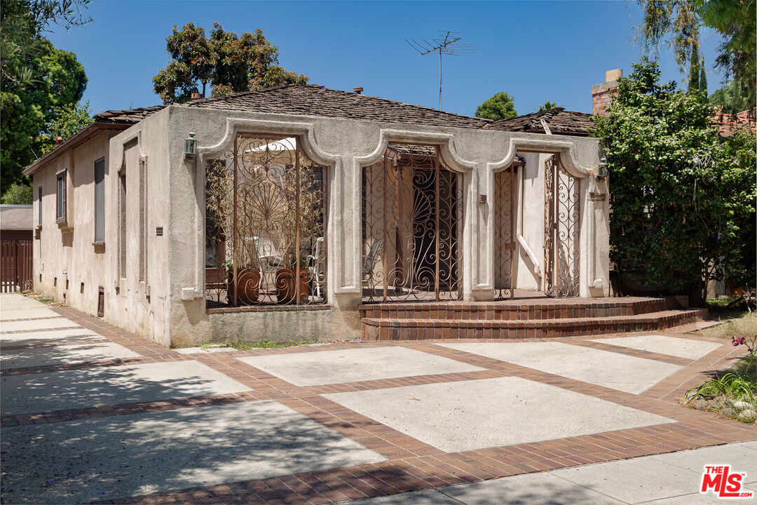 2351 Kelton Avenue Los Angeles, CA 90064 - Photo 1 of 17 a front view of a house