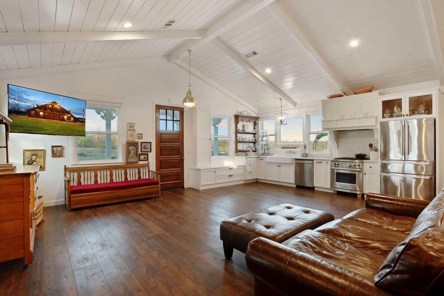 10031 Frankenheimer Road Oakdale, CA 95361 - Photo 11 of 95 a living room with furniture and kitchen view