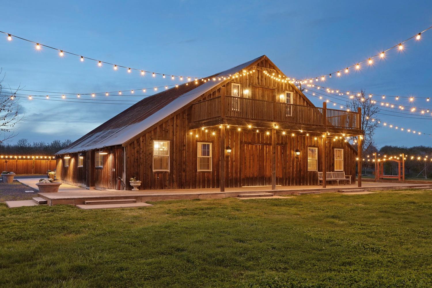 10031 Frankenheimer Road Oakdale, CA 95361 - Photo 12 of 95 a front view of building with yard and swimming pool
