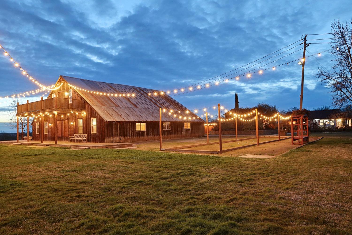 10031 Frankenheimer Road Oakdale, CA 95361 - Photo 15 of 95 a backyard of a house with table and chairs