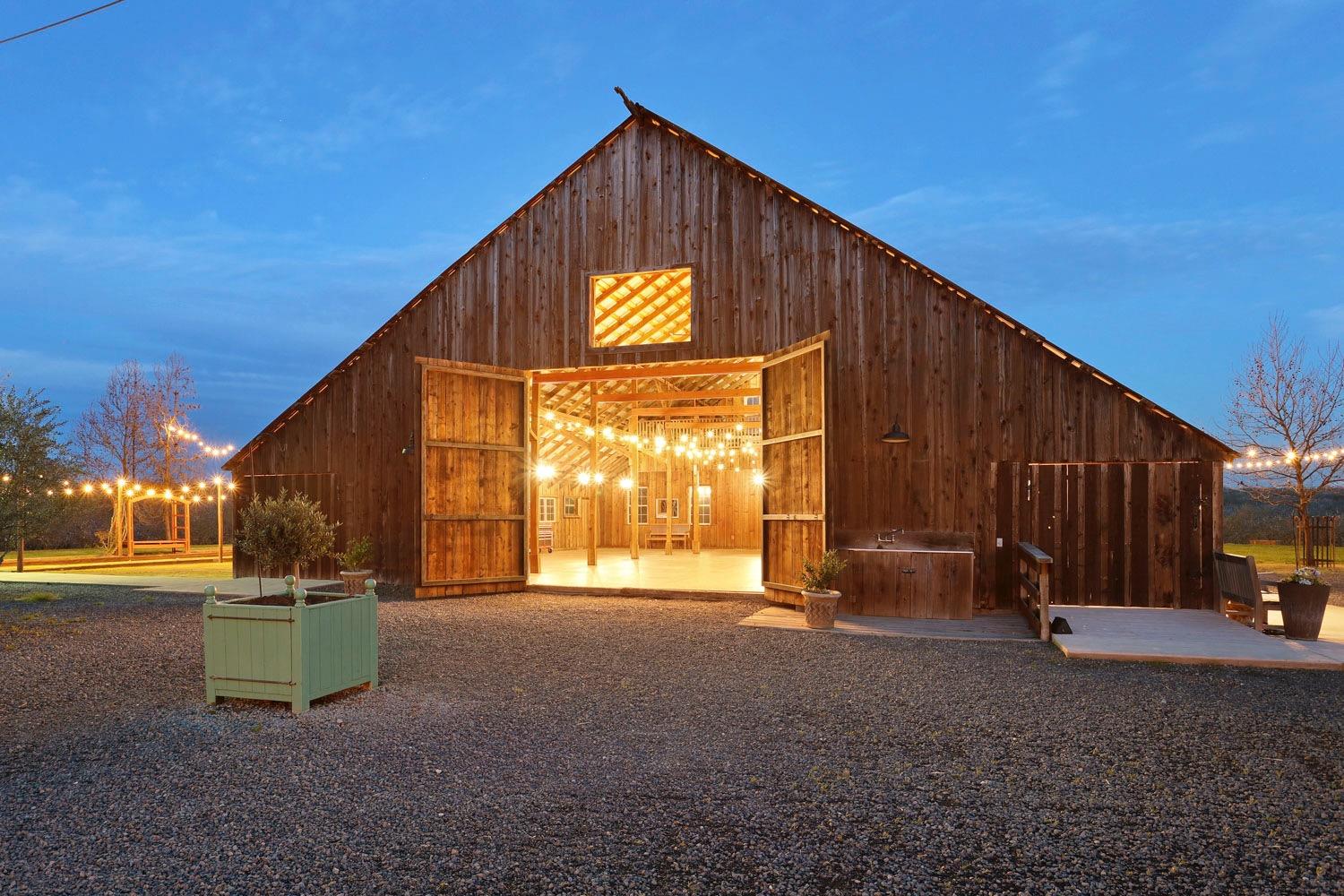 10031 Frankenheimer Road Oakdale, CA 95361 - Photo 16 of 95 a view of a back yard with an empty space and wooden fence
