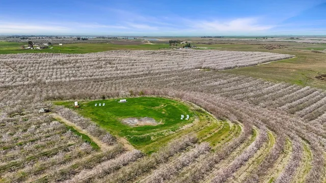 a view of balcony with wooden floor