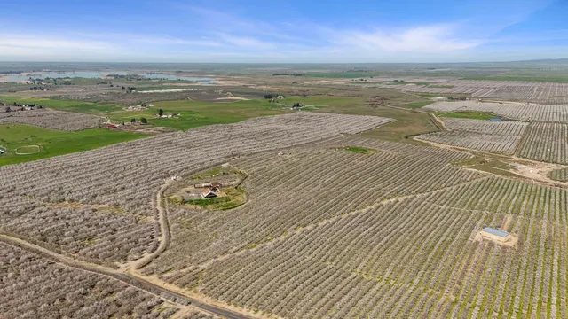 a view of a house with a yard porch and sitting area