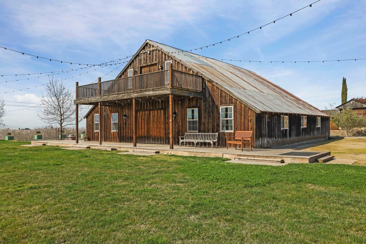 10031 Frankenheimer Road Oakdale, CA 95361 - Photo 78 of 95 a view of a house with a yard porch and sitting area