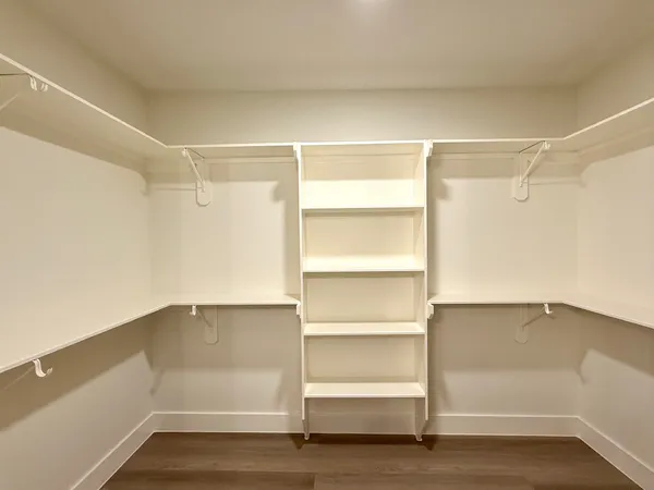 a view of an empty walk in closet