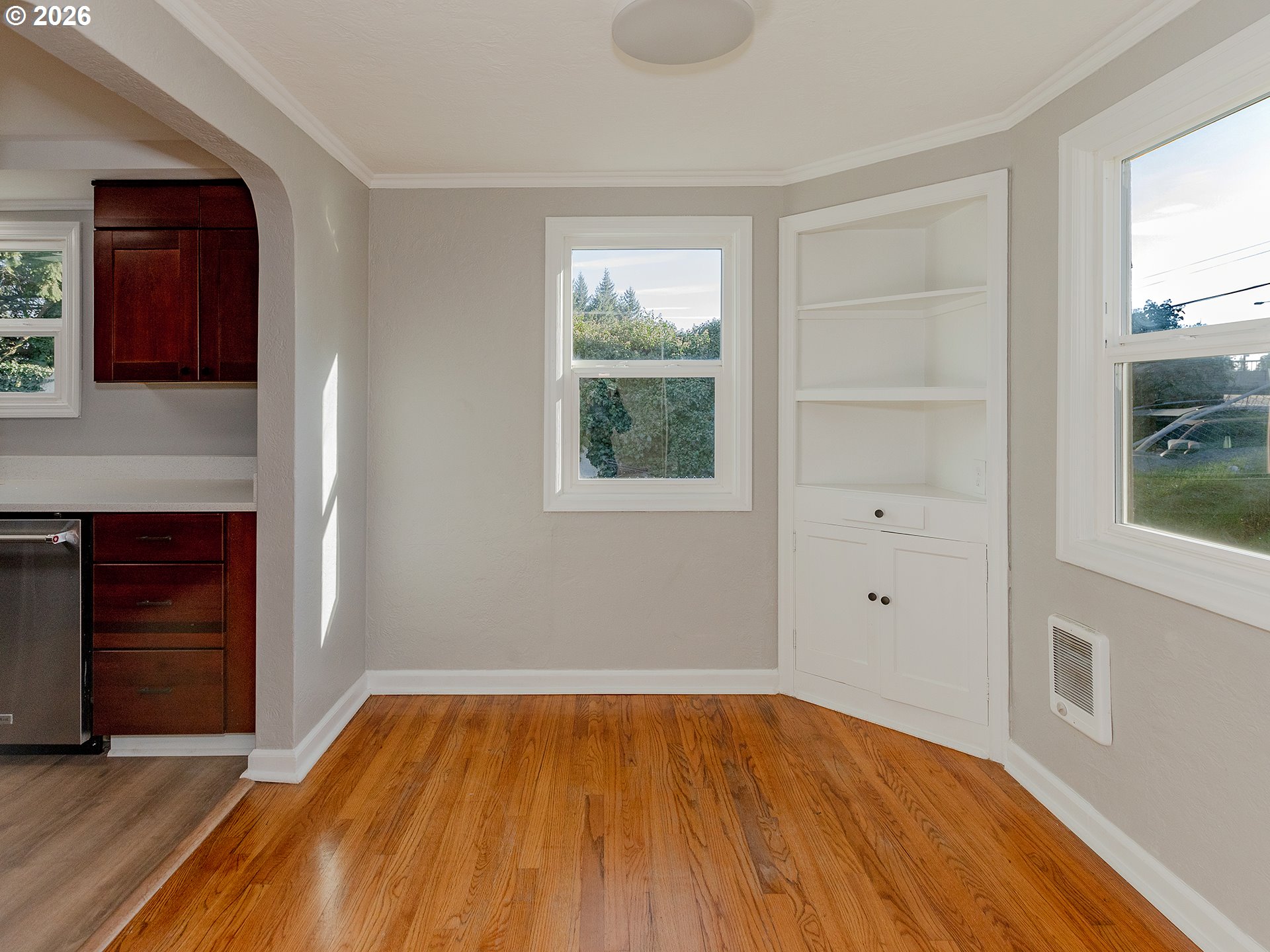 904 East 33rd Street Vancouver, WA 98663 - Photo 11 of 26 a view of empty room with wooden floor and fan