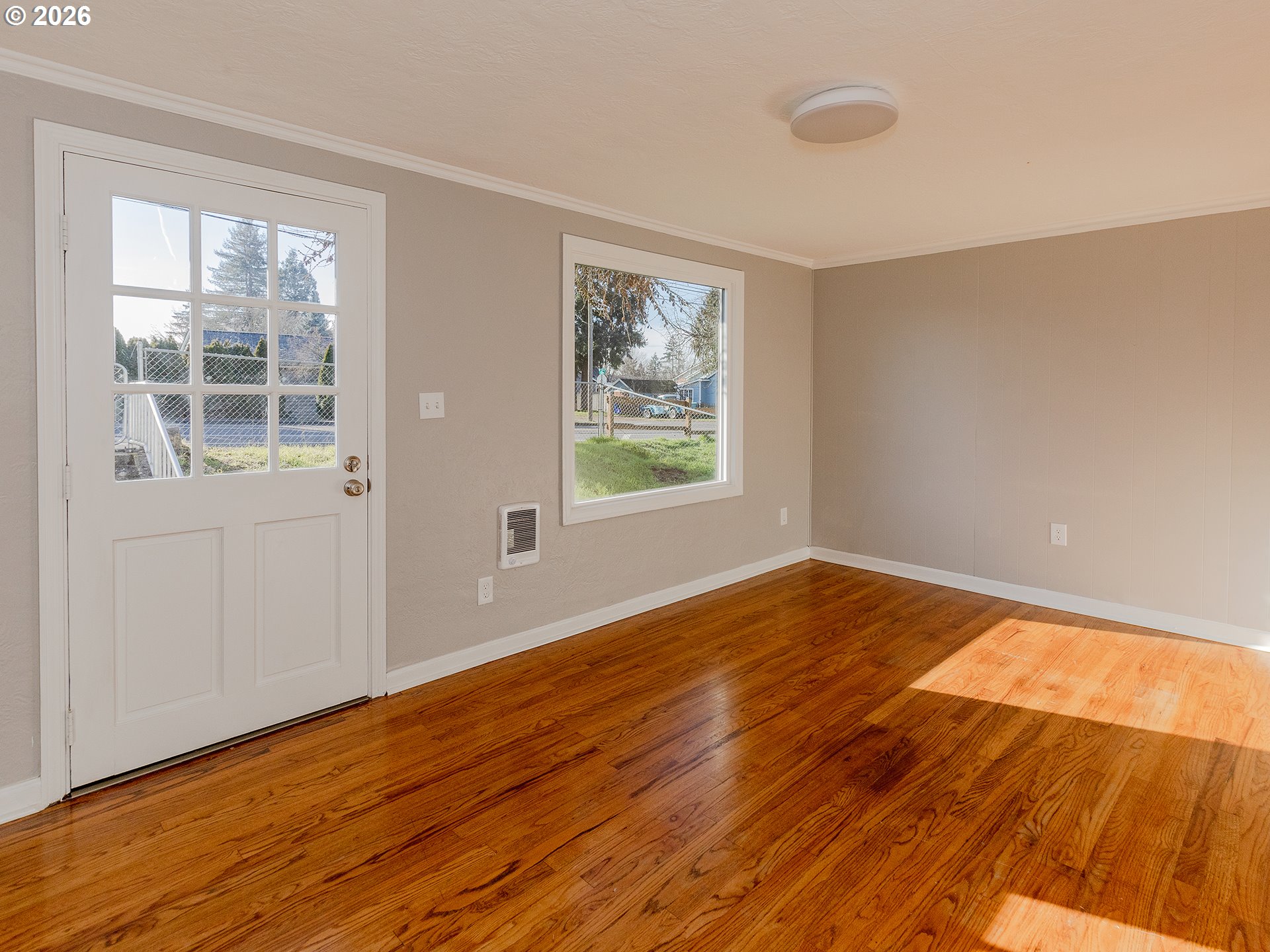 904 East 33rd Street Vancouver, WA 98663 - Photo 13 of 26 a view of empty room with wooden floor and fan
