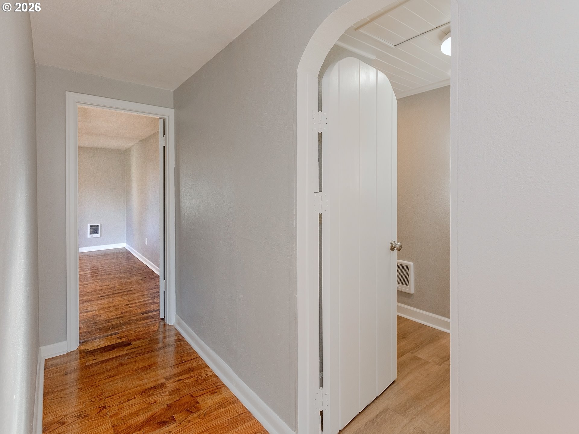 904 East 33rd Street Vancouver, WA 98663 - Photo 16 of 26 a view of a hallway with wooden floor and staircase