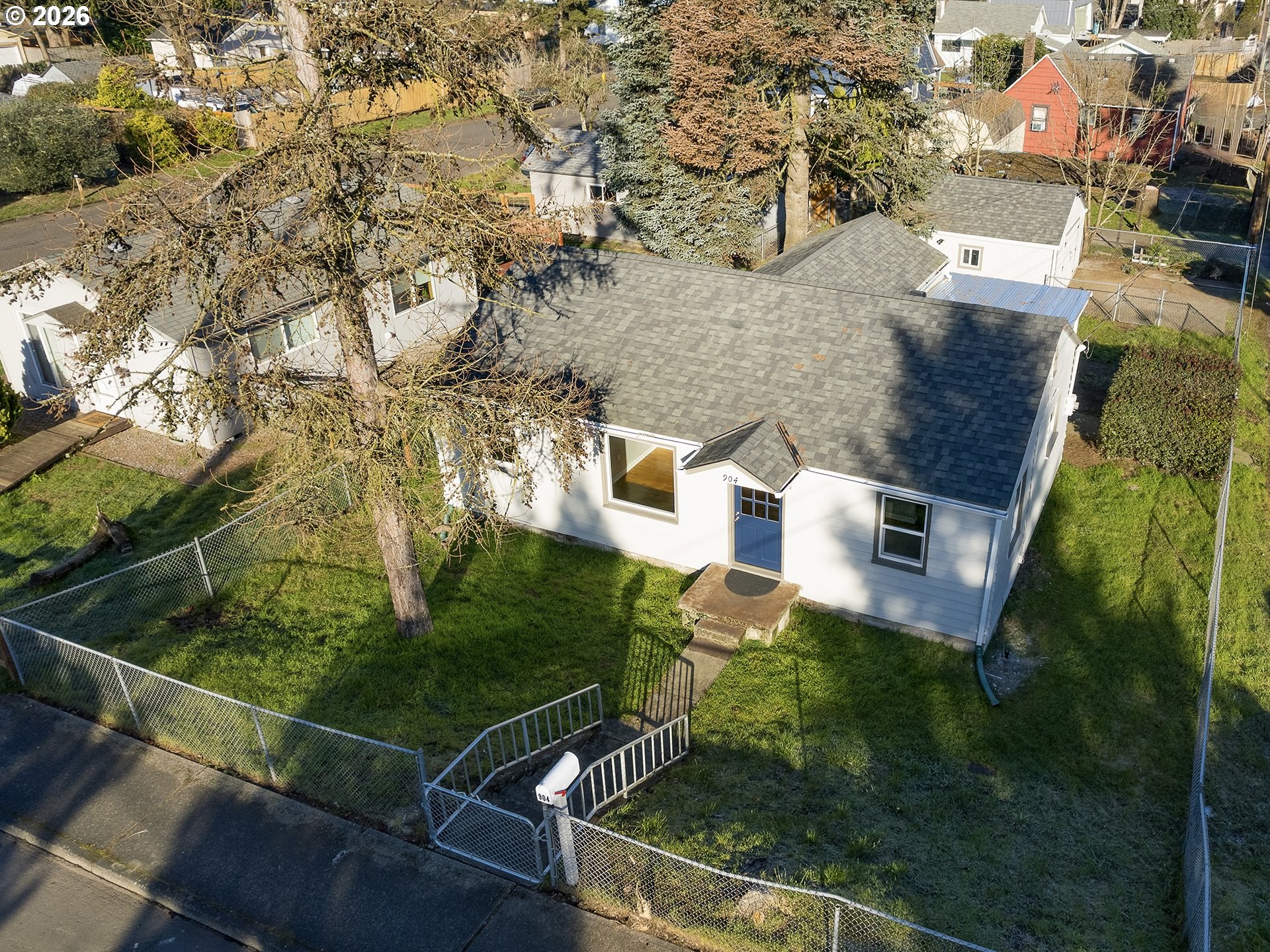 904 East 33rd Street Vancouver, WA 98663 - Photo 2 of 26 an aerial view of residential houses with outdoor space