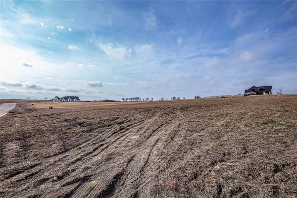 a view of a road with an ocean