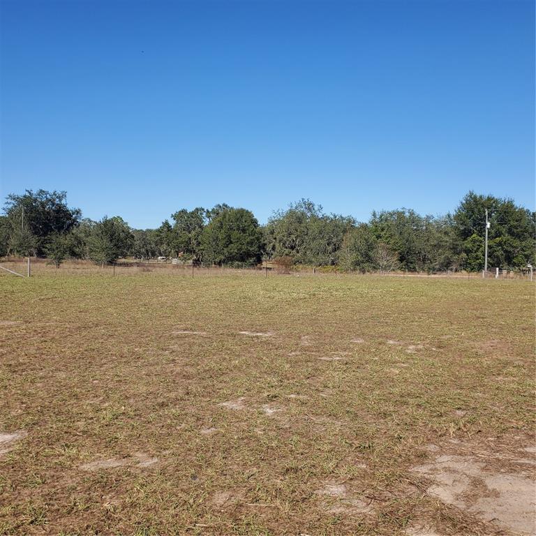 2926 Sharon Road Groveland, FL 34736 - Photo 15 of 16 a view of lake with mountain in the background