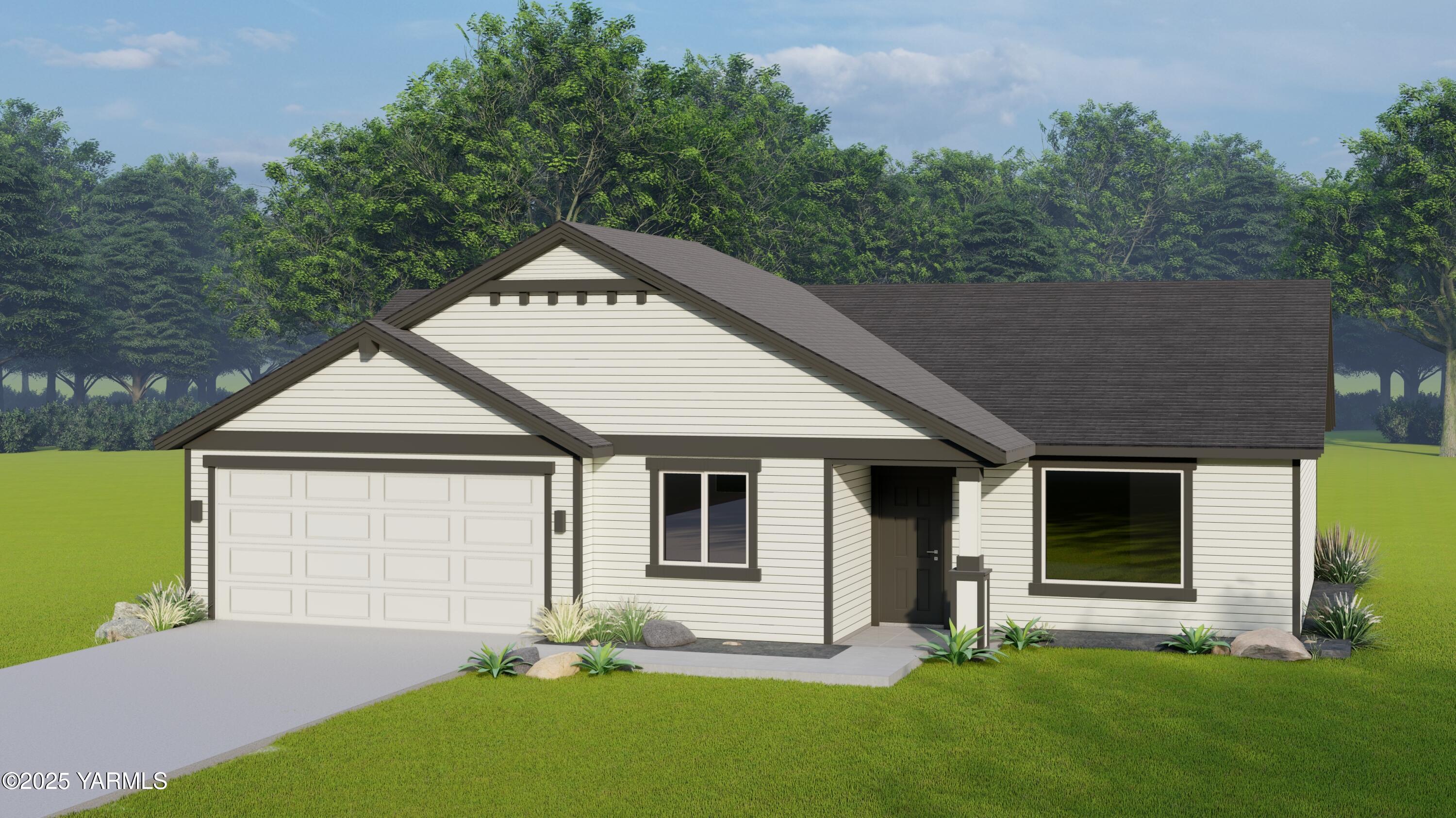 607 Grapevine Street, Unit PHASE 3 LOT 24) PRESALE Grandview, WA 98930 - Photo 1 of 2 a house with garden in front of it