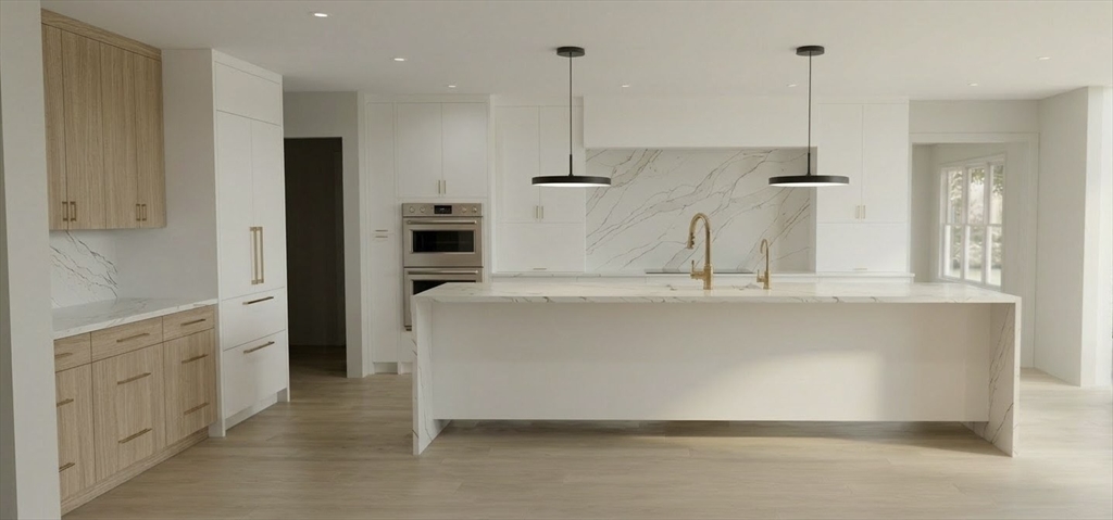 18 Annawan Road Newton, MA 02468 - Photo 3 of 7 a bathroom with a double vanity sink a mirror and a shower