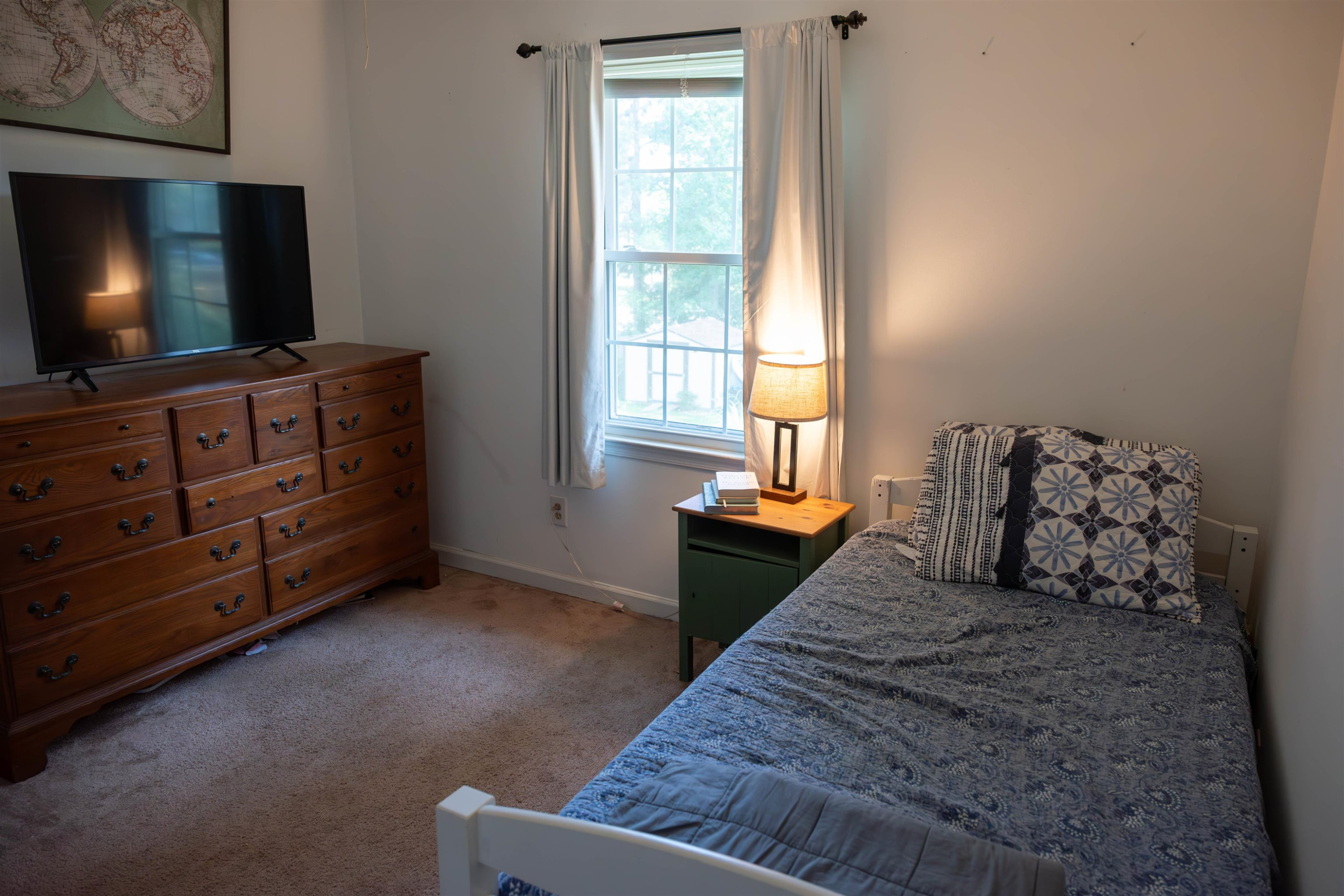 1301 Buckhorn Road Garner, NC 27529 - Photo 16 of 24 a living room with furniture and a flat screen tv