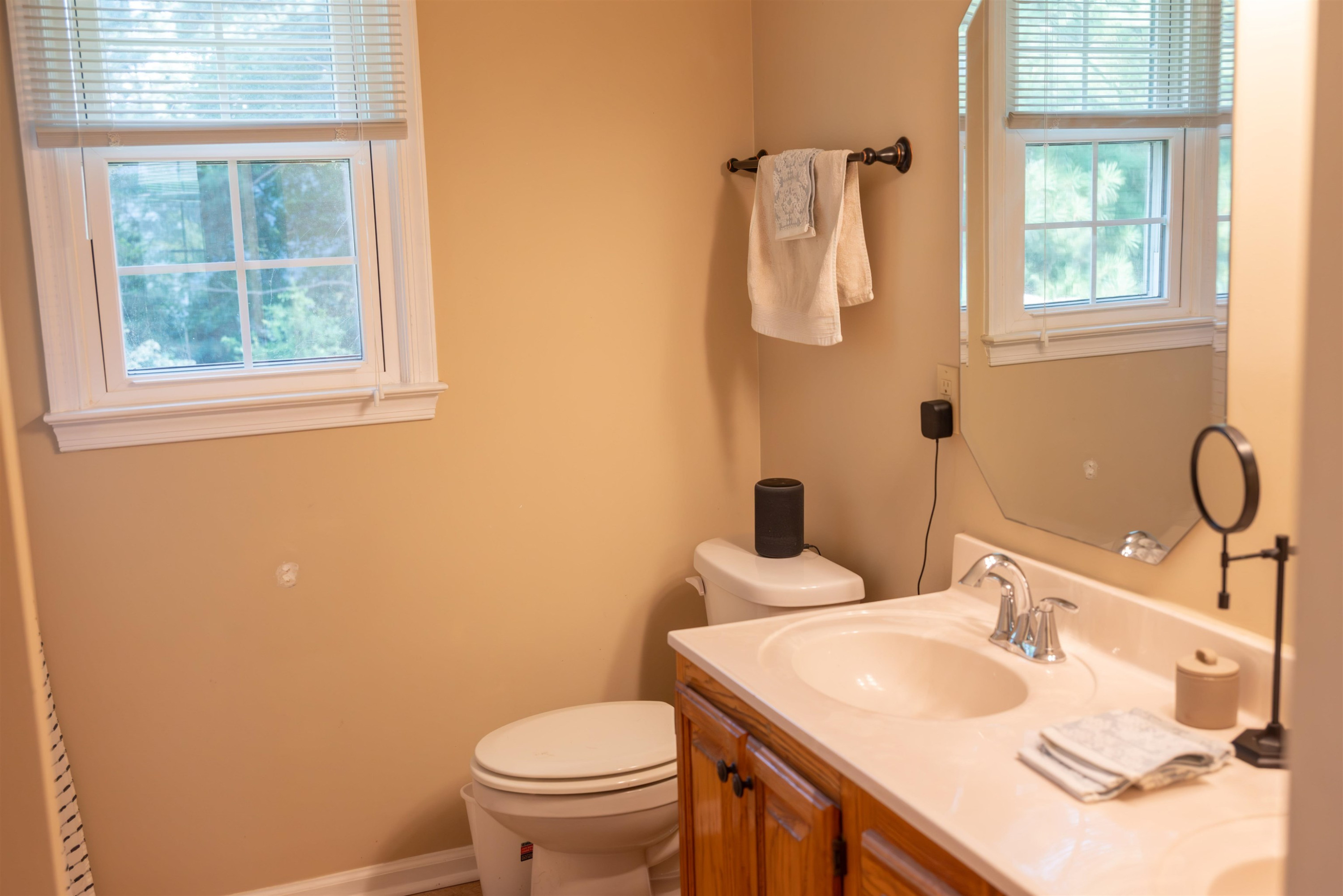 1301 Buckhorn Road Garner, NC 27529 - Photo 20 of 24 a bathroom with a sink toilet and vanity