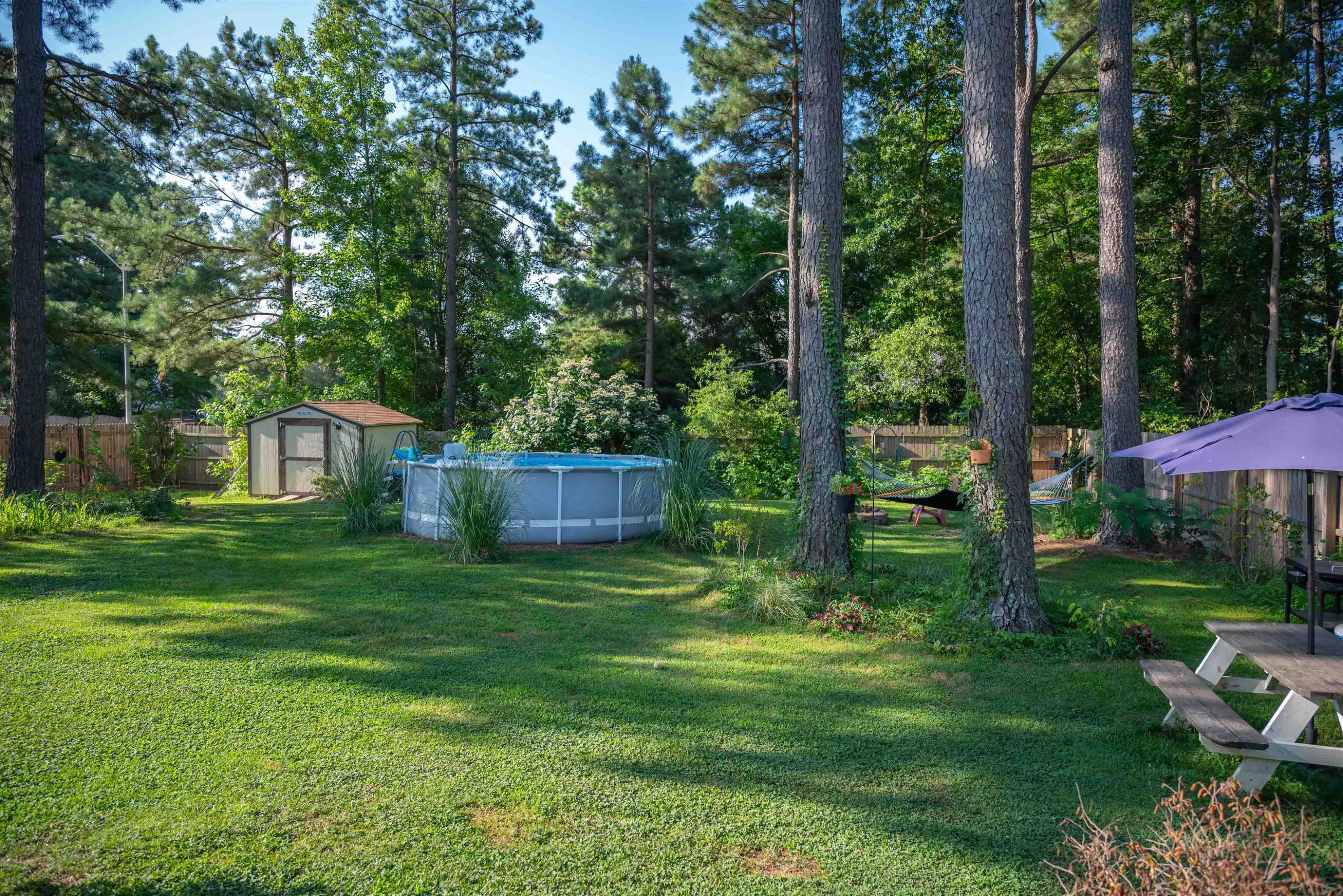 1301 Buckhorn Road Garner, NC 27529 - Photo 23 of 24 a view of a house with a yard and a garden