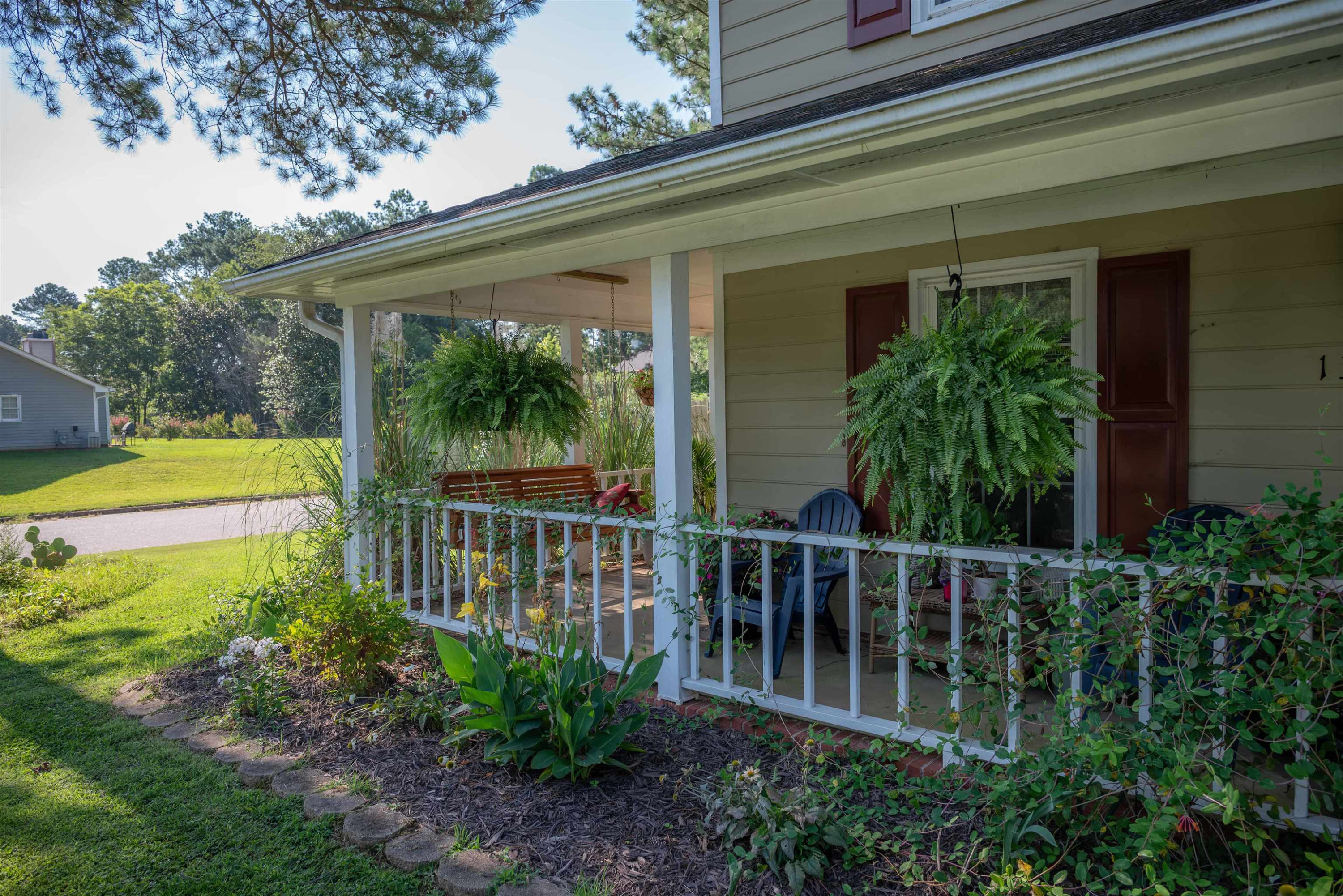 1301 Buckhorn Road Garner, NC 27529 - Photo 4 of 24 a view of a backyard with plants
