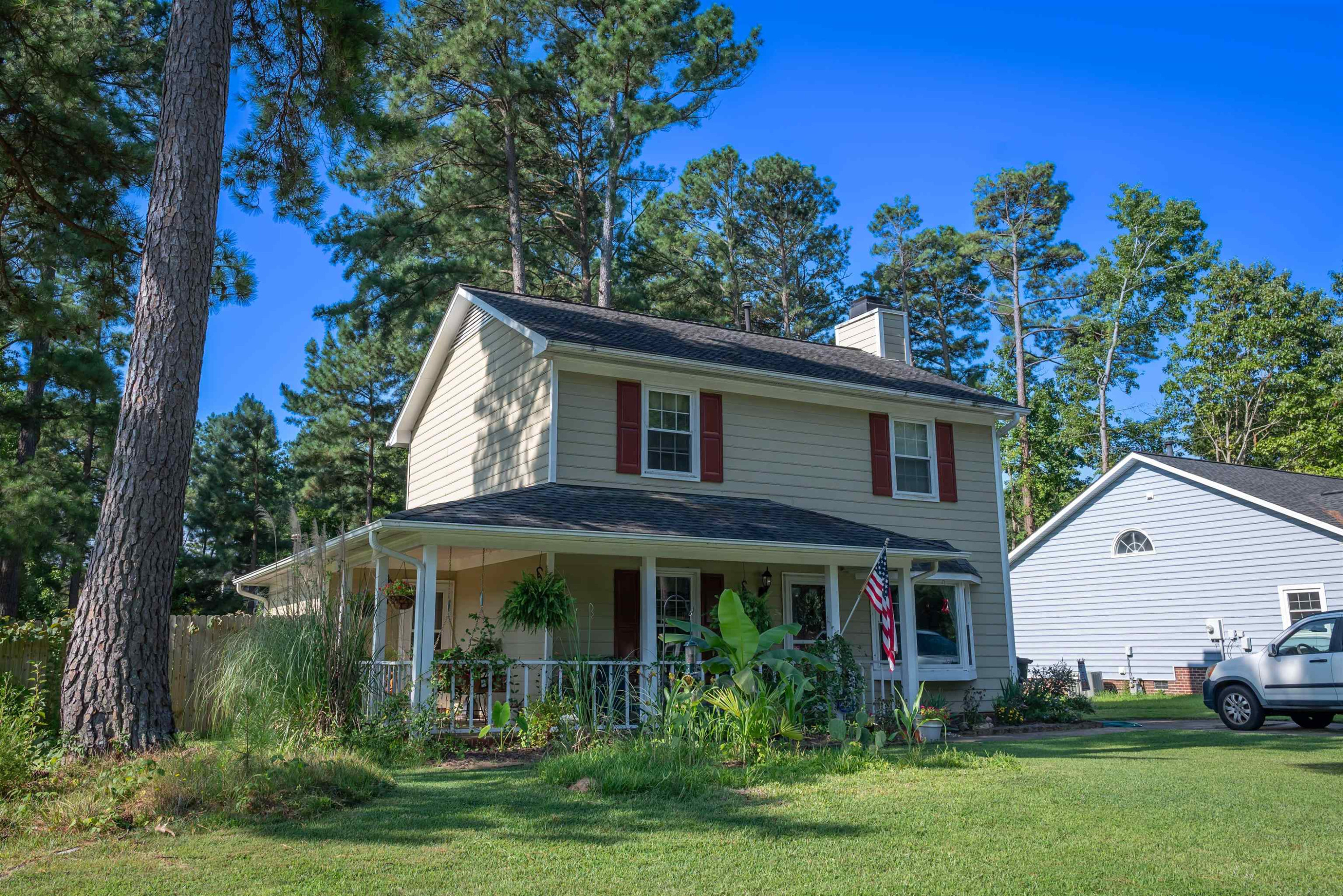 1301 Buckhorn Road Garner, NC 27529 - Photo 5 of 24 a front view of a house with a yard