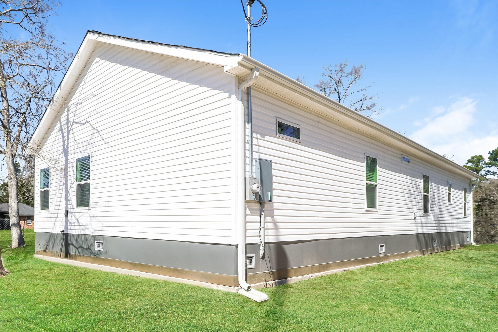 8516 Kellett Street Houston, TX 77028 - Photo 15 of 16 a front view of a house with a yard