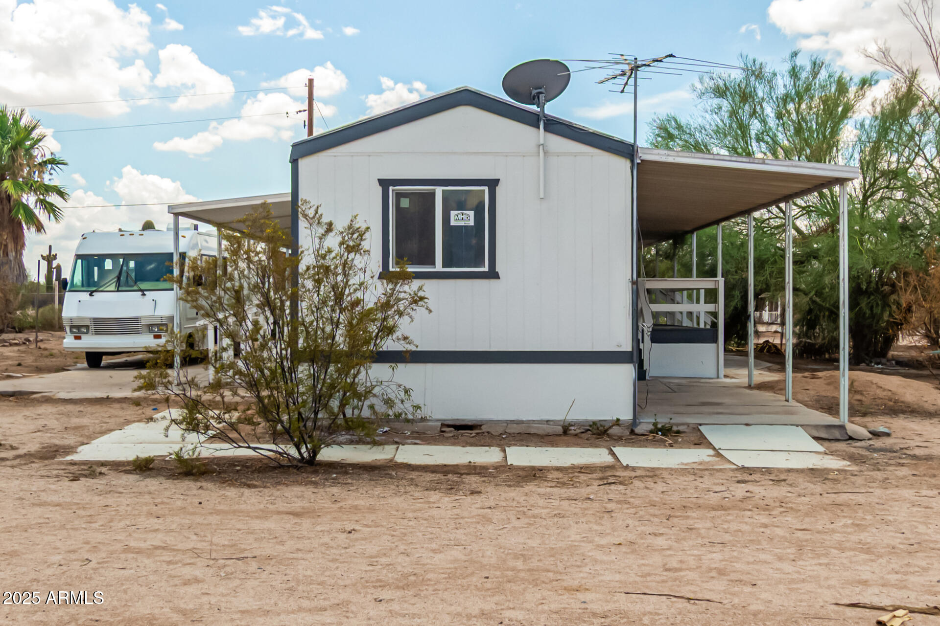 3663 North Thistle Drive Florence, AZ 85132 - Photo 19 of 29 a view of a house with backyard
