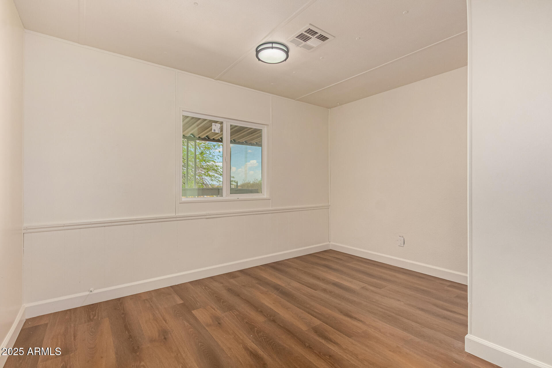 3663 North Thistle Drive Florence, AZ 85132 - Photo 25 of 29 an empty room with a window