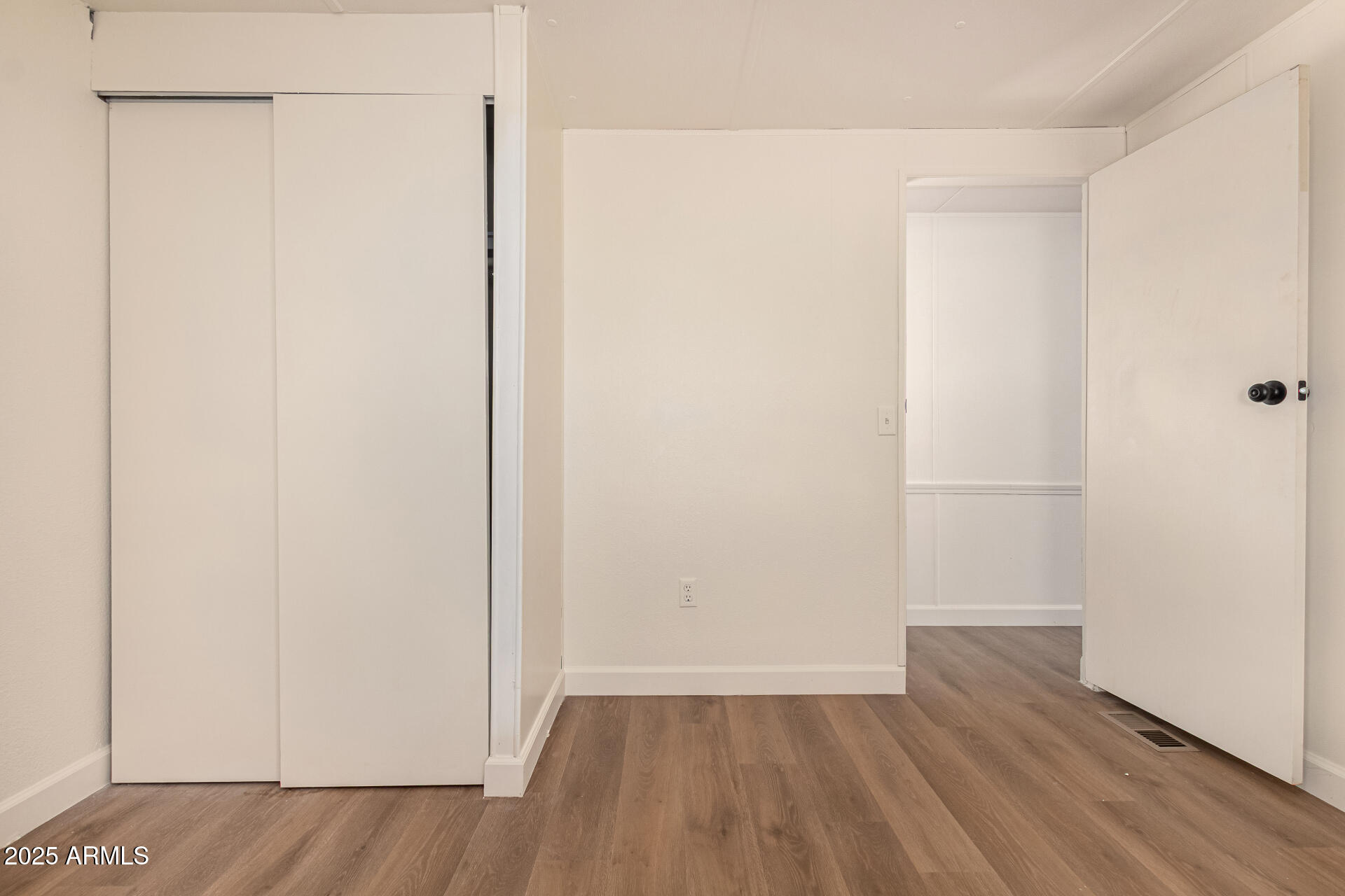 3663 North Thistle Drive Florence, AZ 85132 - Photo 26 of 29 a view of a small space with wooden floor