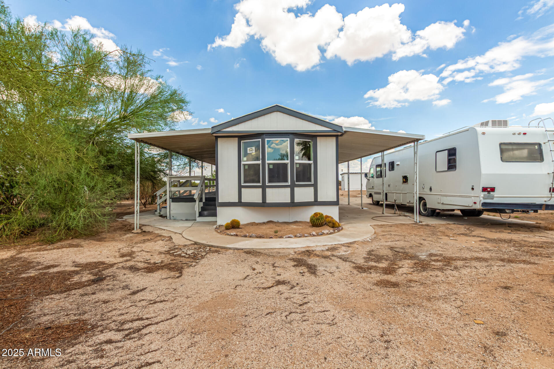 3663 North Thistle Drive Florence, AZ 85132 - Photo 10 of 29 a view of a house with backyard