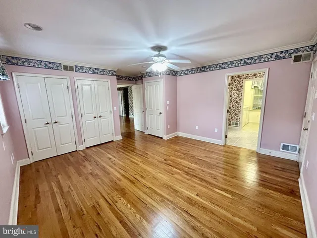 a bathroom with a sink a mirror and a shower