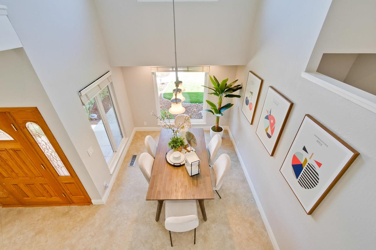 22266 Hartman Drive Cupertino, CA 95014 - Photo 14 of 73 a view of living room with furniture and a table