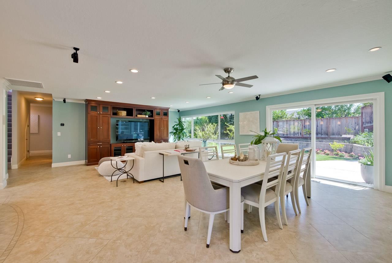 22266 Hartman Drive Cupertino, CA 95014 - Photo 26 of 73 a view of a dining room with furniture window and outside view