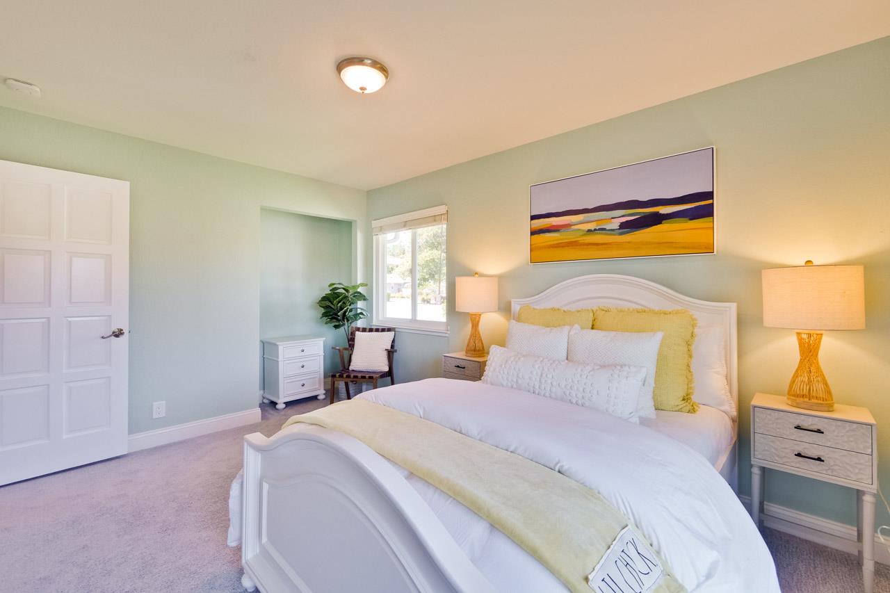 22266 Hartman Drive Cupertino, CA 95014 - Photo 30 of 73 a bedroom with a bed and a cabinets