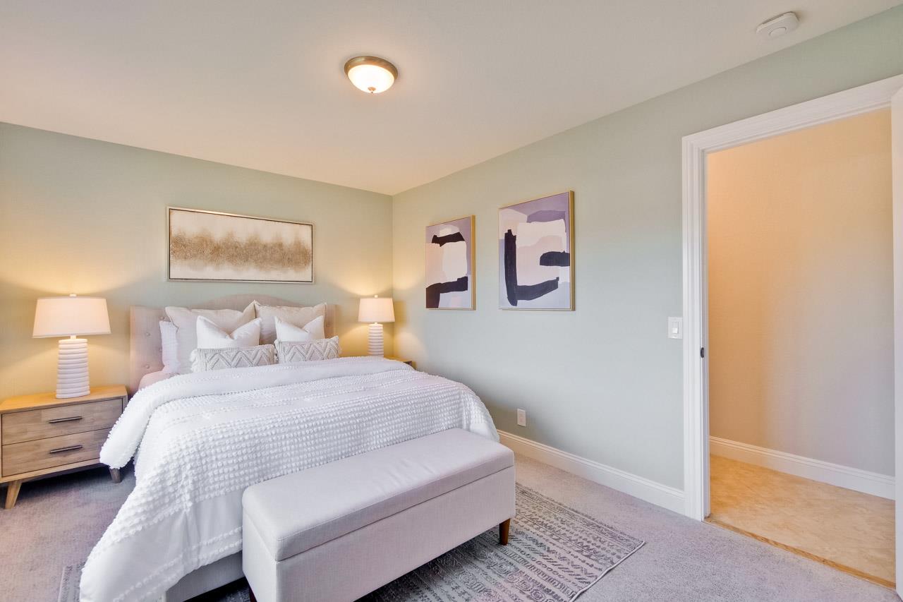 22266 Hartman Drive Cupertino, CA 95014 - Photo 35 of 73 a bedroom with a bed and a window