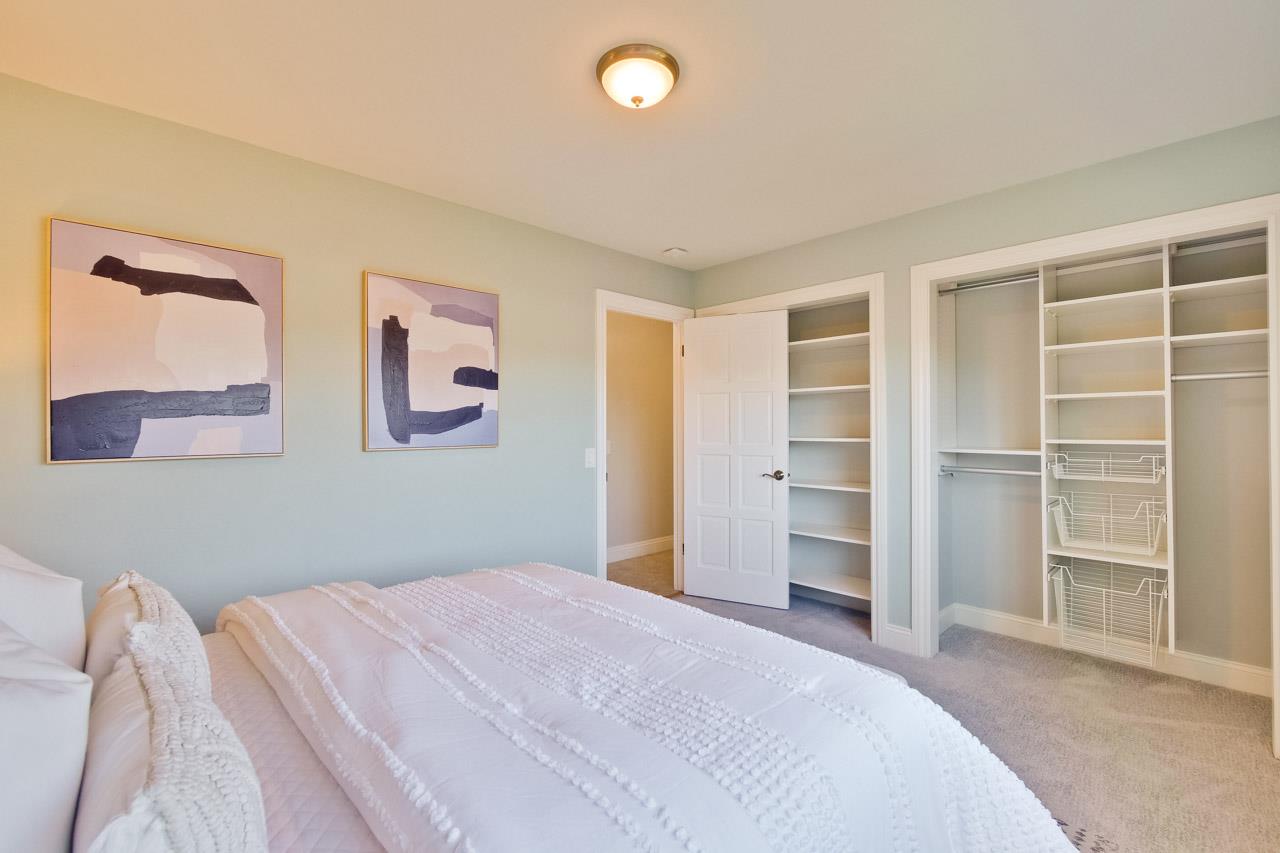 22266 Hartman Drive Cupertino, CA 95014 - Photo 36 of 73 a bedroom with a bed and a window