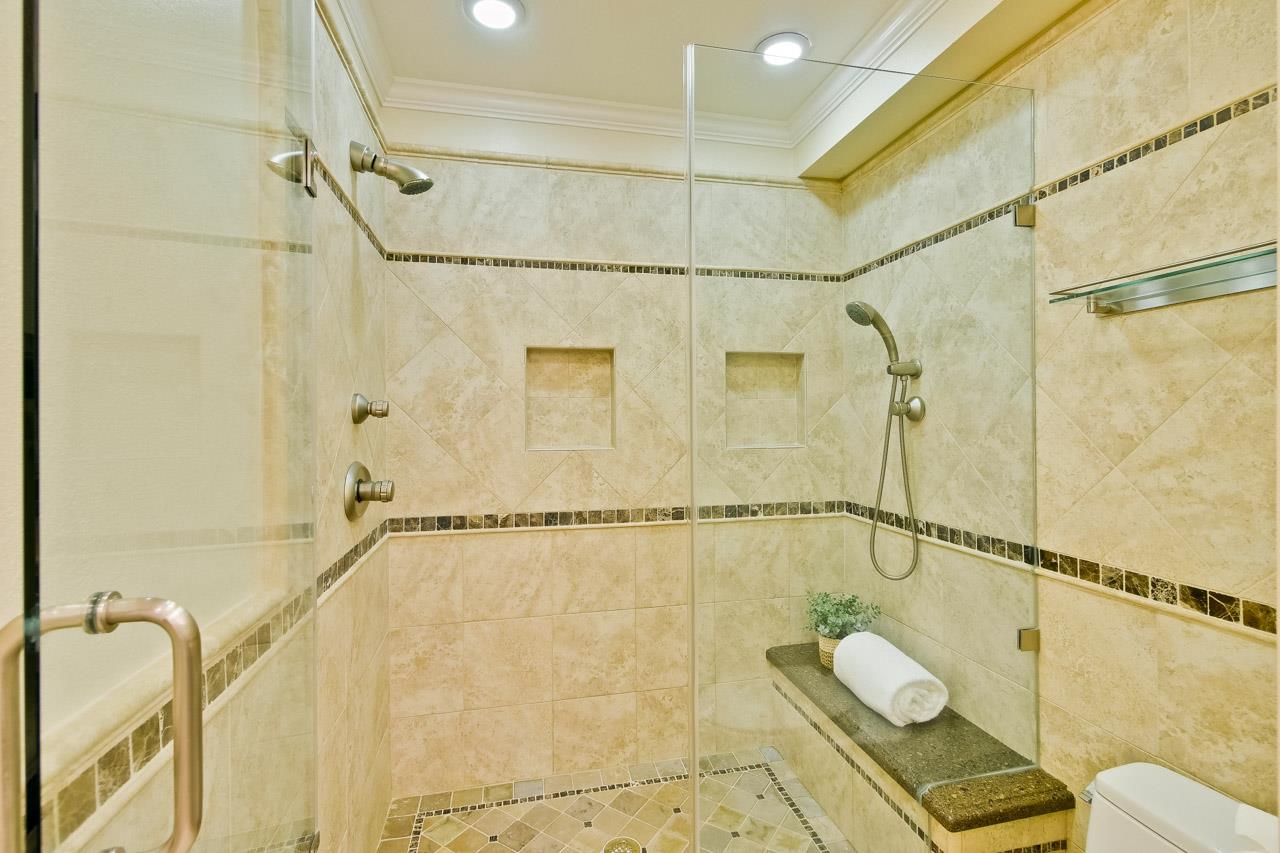 22266 Hartman Drive Cupertino, CA 95014 - Photo 40 of 73 a bathroom with a shower and a shower