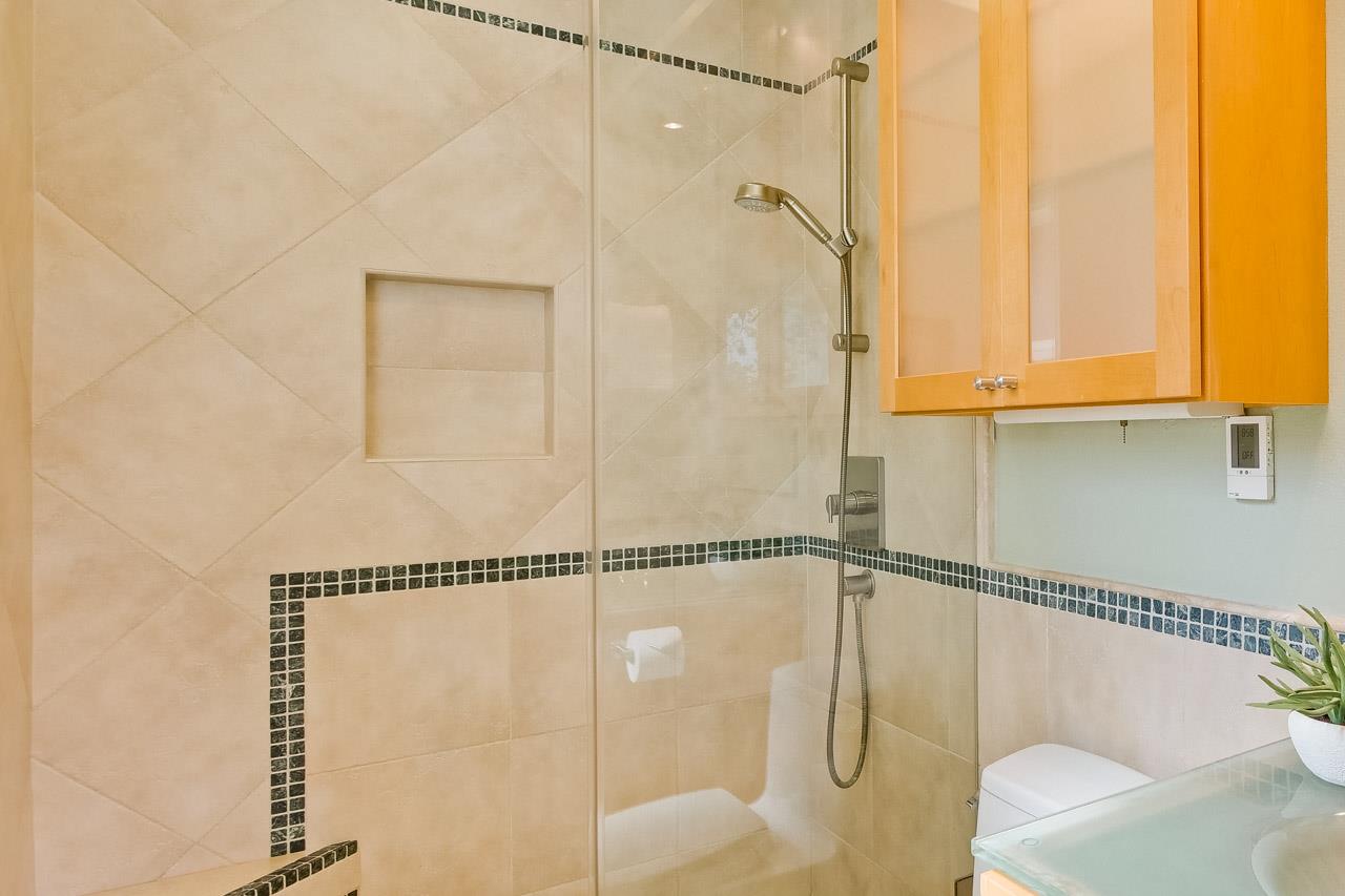 22266 Hartman Drive Cupertino, CA 95014 - Photo 43 of 73 a bathroom with a shower and a shower