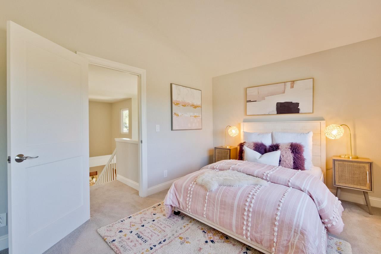 22266 Hartman Drive Cupertino, CA 95014 - Photo 46 of 73 a bedroom with a bed and a painting on the wall