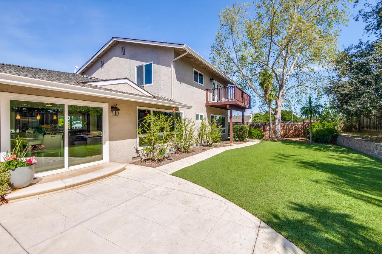 22266 Hartman Drive Cupertino, CA 95014 - Photo 63 of 73 a front view of a house with garden and porch