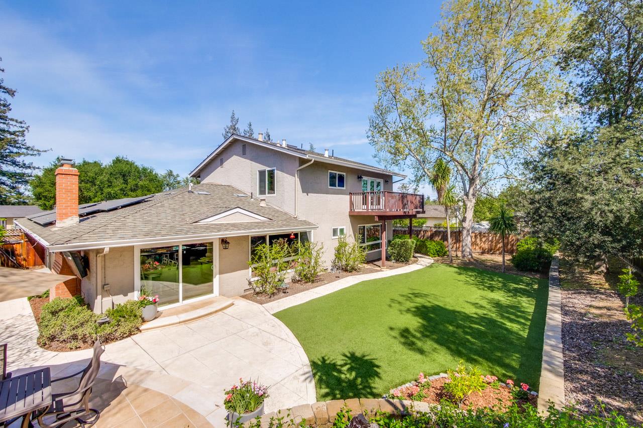 22266 Hartman Drive Cupertino, CA 95014 - Photo 67 of 73 a front view of a house with garden