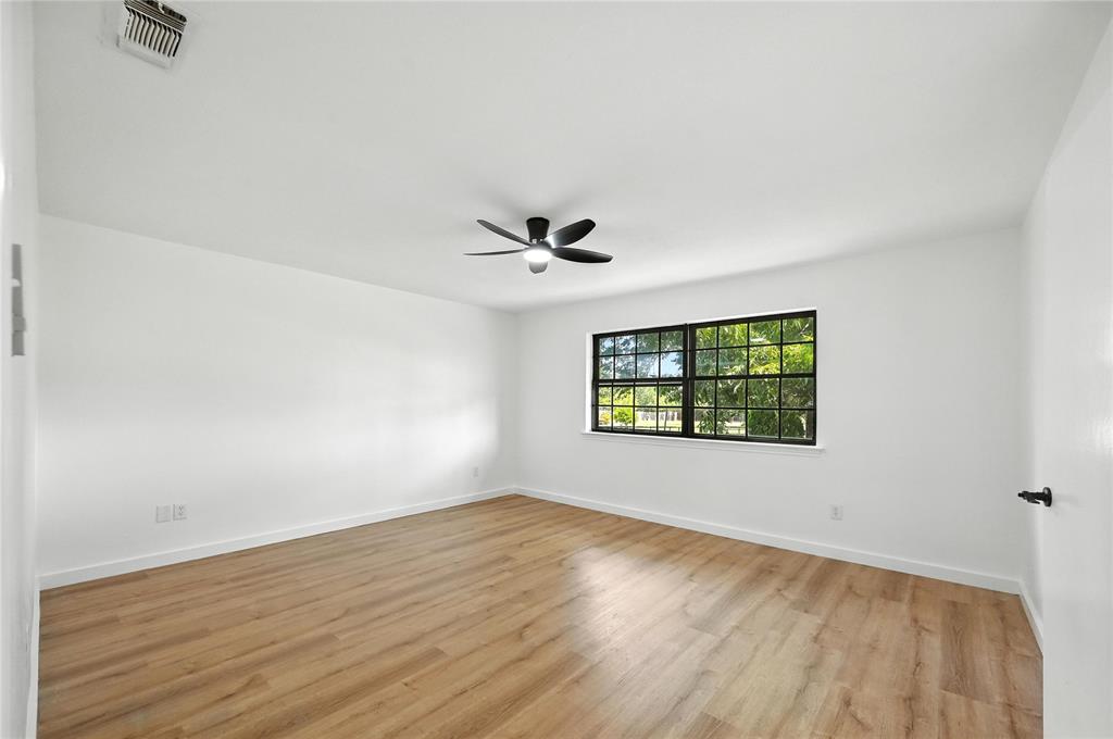 3309 Larkin Lane Rowlett, TX 75089 - Photo 13 of 18 a view of an empty room with a window