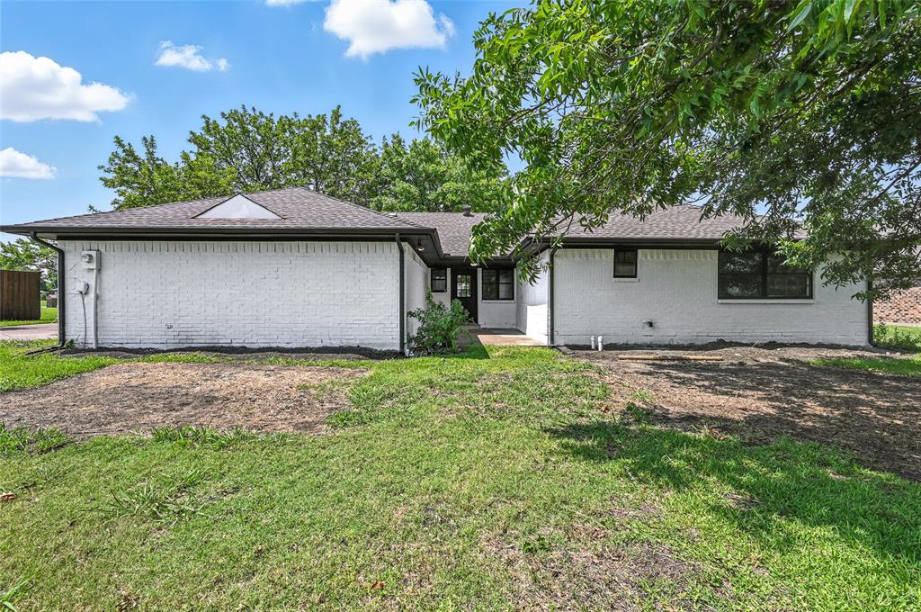 3309 Larkin Lane Rowlett, TX 75089 - Photo 17 of 18 a front view of house with yard and trees