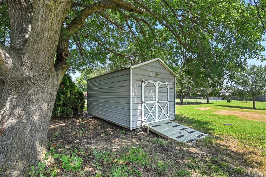 3309 Larkin Lane Rowlett, TX 75089 - Photo 18 of 18 a front view of a house with a yard