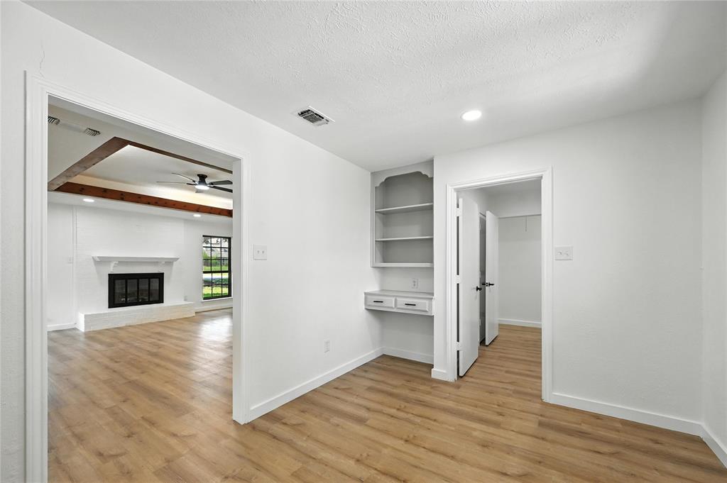 3309 Larkin Lane Rowlett, TX 75089 - Photo 7 of 18 a view of empty room with wooden floor