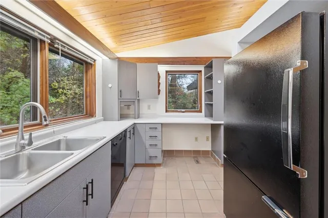 a bathroom with a bathtub and a sink