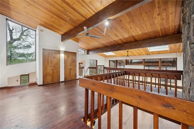 a bathroom with a tub and sink
