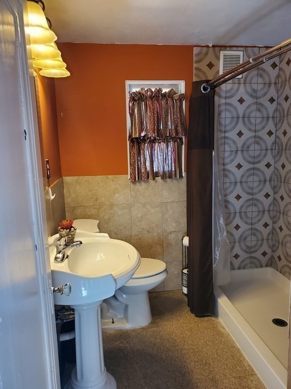 48 Merrill Road Springfield, MA 01119 - Photo 16 of 38 a bathroom with a sink and a tub