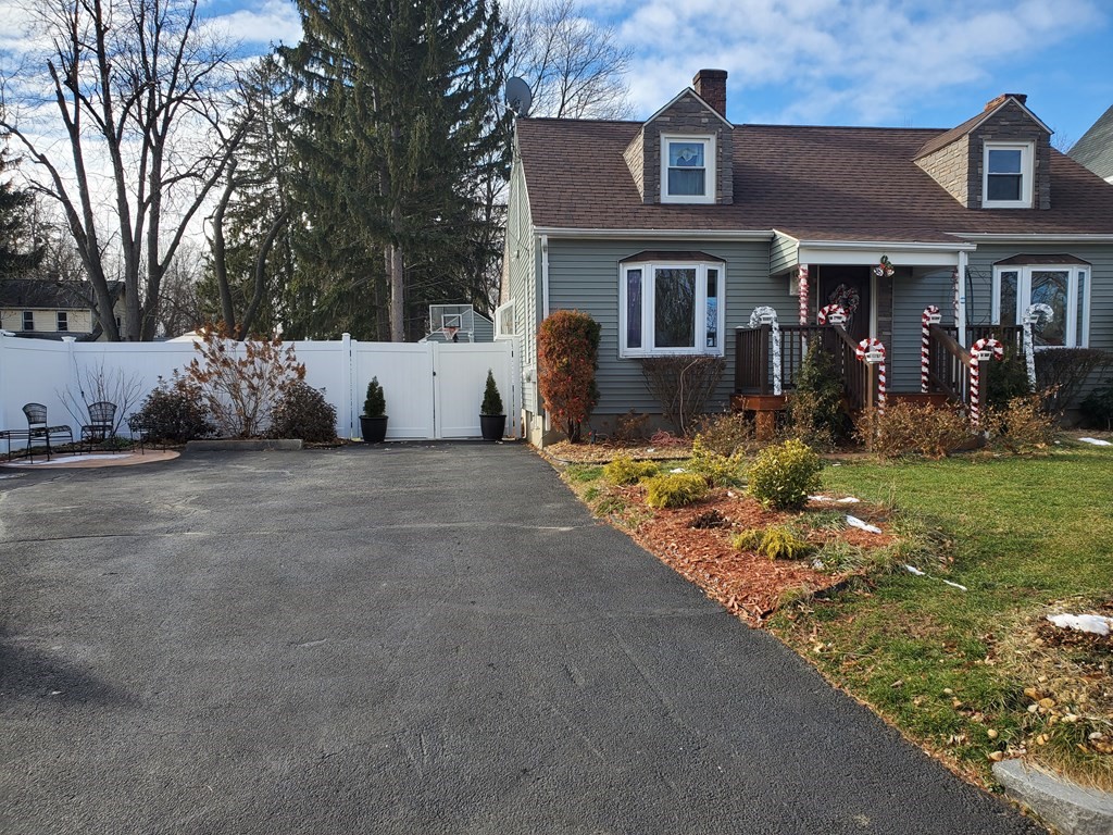 48 Merrill Road Springfield, MA 01119 - Photo 3 of 38 a view of a house with a yard