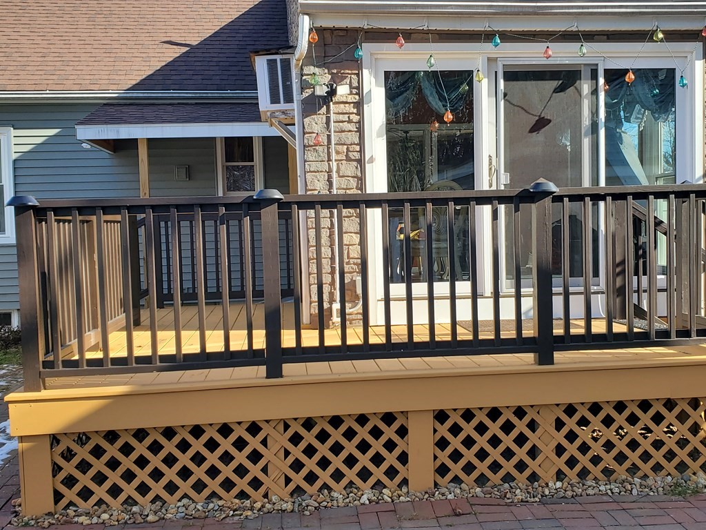 48 Merrill Road Springfield, MA 01119 - Photo 4 of 38 a view of a black and white wooden fence